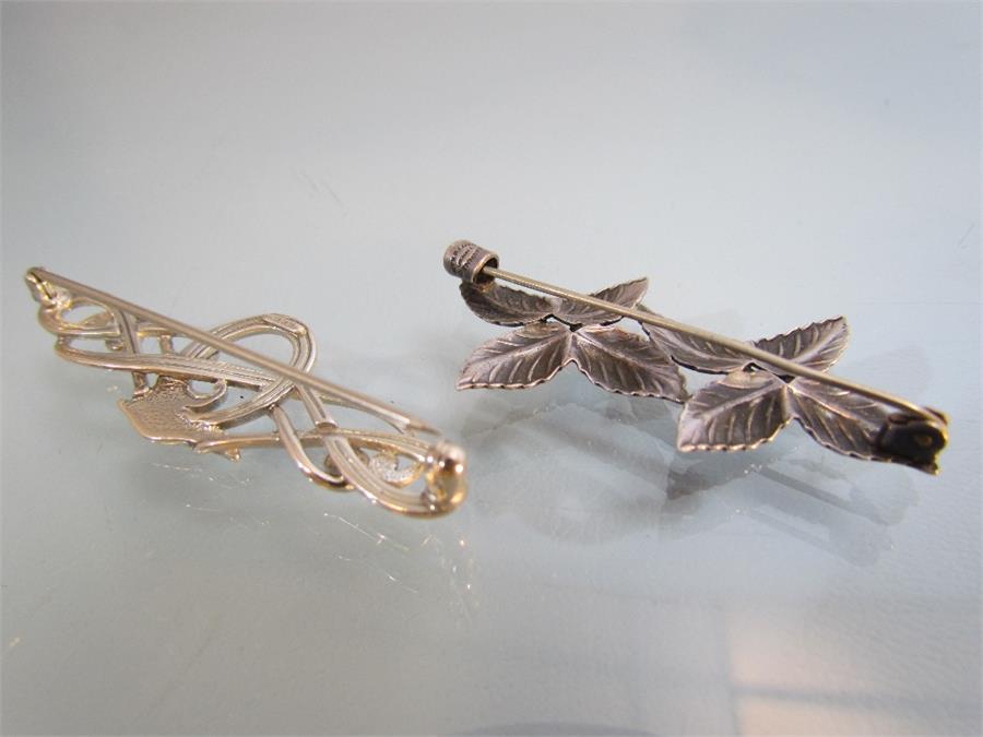 Two silver brooches - 1) Marked DENMARK JOHN L Sterling on the 'C' clasp this double leaf flower - Image 4 of 5