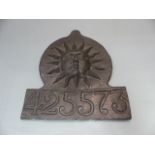 Lead Fire plaque with sun design and numbered 425573.