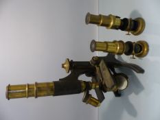 Early 20th Century gilt and brass monocular microscope with two other lenses