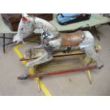 Early wooden dapple grey rocking horse (unmarked). On painted base. Large naive head with open