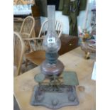 Antique oil lamp and a set of postage scales