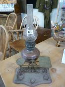 Antique oil lamp and a set of postage scales