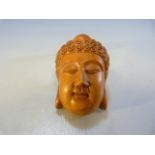 Wooden Netsuke of a Buddhist head