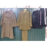 Two sets of Military Dress uniform - to include trousers, overcoat etc