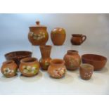 Collection of Watcombe Pottery Redware (Terracotta) - to include Tobacco jars, miniature jugs, small