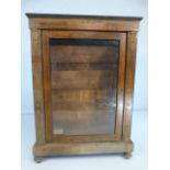 Antique music cabinet with applied Gilt decoration and glazed door