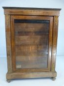 Antique music cabinet with applied Gilt decoration and glazed door