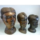 Carved hardwood African busts - Three busts to include a large example and two smaller