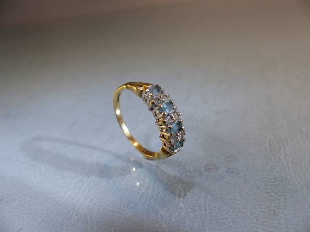 9ct GOLD half Eternity ring set with blue Topaz stones. Size M.5 - Image 9 of 9