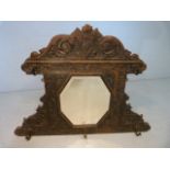 Antique Arts and Crafts hall mirror with cast metal hooks