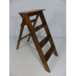 Vintage set of wooden stepladders