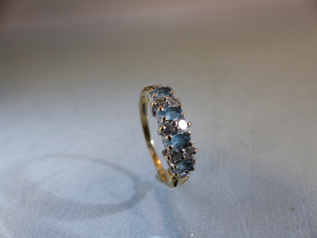 9ct GOLD half Eternity ring set with blue Topaz stones. Size M.5 - Image 3 of 9