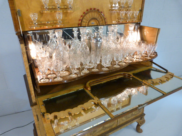 Art Deco walnut cocktail cabinet with drop front above two cupboards. Opens to reveal mirrored light - Image 9 of 25