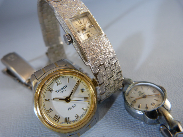 Three ladies silver coloured metal wrist watches. Two dress watches A/F by Accurist & CYMA and a - Image 8 of 9