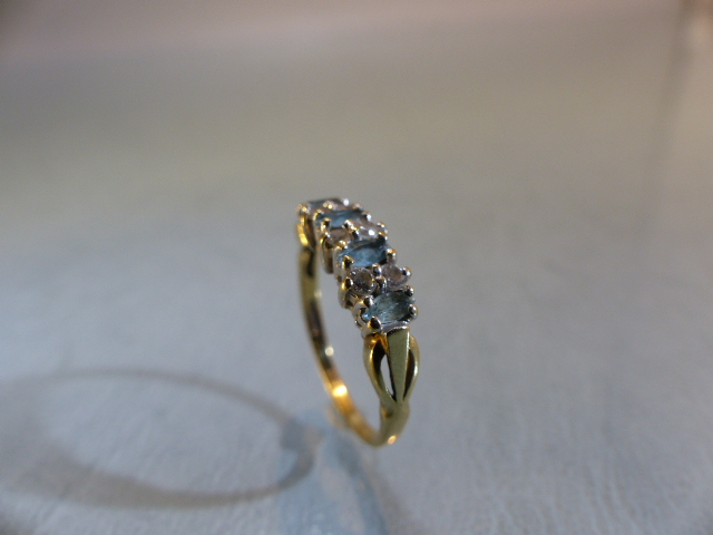 9ct GOLD half Eternity ring set with blue Topaz stones. Size M.5 - Image 2 of 9