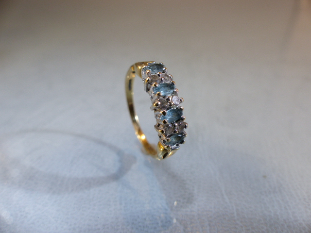 9ct GOLD half Eternity ring set with blue Topaz stones. Size M.5 - Image 5 of 9