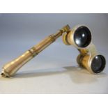 Pair of Mother of Pearl opera Glasses with filigree and mother of pearl handle.