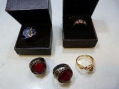 Two boxed sterling silver rings along with three others loose