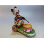 Vintage clockwork toy - 'Chinese' of a drumming panda bear