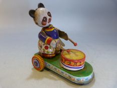 Vintage clockwork toy - 'Chinese' of a drumming panda bear