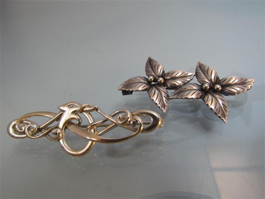 Two silver brooches - 1) Marked DENMARK JOHN L Sterling on the 'C' clasp this double leaf flower - Image 5 of 5