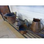 Unusual selection of copper and brass kettles and cooking pans