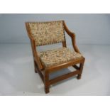 Oak studded and upholstered bedroom chair