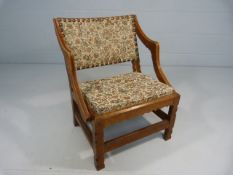 Oak studded and upholstered bedroom chair