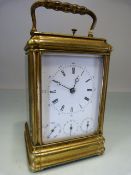 French Aiguilles brass carriage clock with three additional dials below for day/ month/ date, the