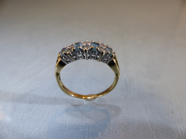 9ct GOLD half Eternity ring set with blue Topaz stones. Size M.5 - Image 8 of 9