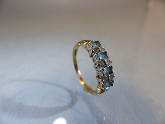 9ct GOLD half Eternity ring set with blue Topaz stones. Size M.5 - Image 4 of 9