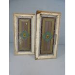 Two stained glass windows with amber knop to middle