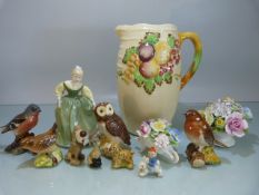 Selection of Royal Doulton and Beswick collectable pottery to include Birds and posies.