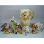 Selection of Royal Doulton and Beswick collectable pottery to include Birds and posies.