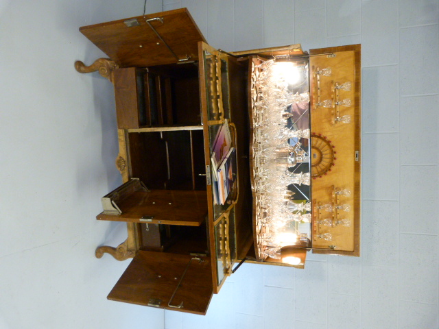 Art Deco walnut cocktail cabinet with drop front above two cupboards. Opens to reveal mirrored light - Image 14 of 25