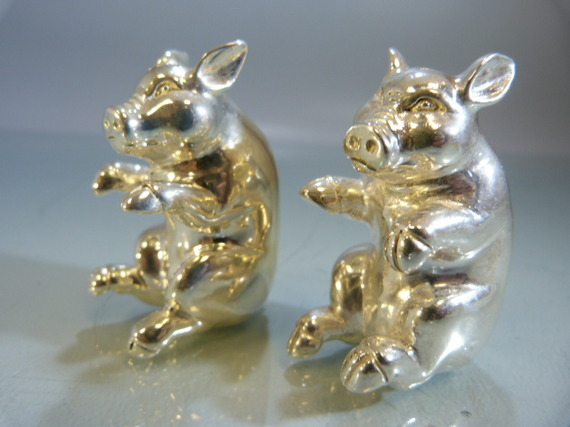 Pair of 800 silver condiments in the form of pigs