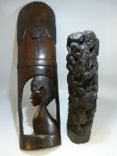 Two pieces of African Tribal art - one in the style of a Totem pole and a hanging wall plaque.
