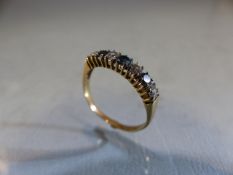 9ct GOLD half Eternity ring set with blue Topaz accentuated with CZ's. Size O