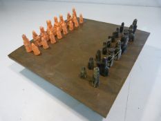 Middle eastern bronze patina-ted chess game complete with figures
