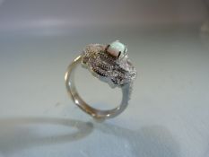 Silver and CZ dress ring with central opalite panel