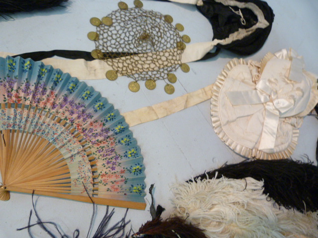 Selection of Ostrich Dress feathers, fan and a Middle Eastern headdress adorned with coins on a gold - Image 2 of 10