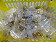 Basket containing large quantity of earrings