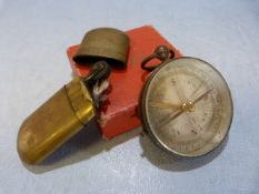 Brass cased pocket compass along with a Comoy Brass lighter No.22