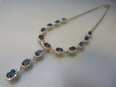Silver CZ and Iolite-set 14 panel necklace