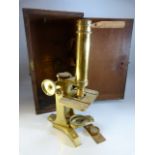 MICROSCOPE - An M. Pillischer of London brass microscope no.585 Titled 'Beck' in original oak casing