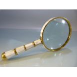 Brass and mother of pearl-handled magnifying glass