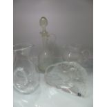 Four pieces of Crystal glassware to include - Large decanter, wine decanter, 'Twisted' water jug