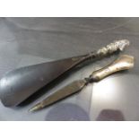 Edwardian Shoe Horn modelled as Mr.Punch by Crisford & Norris Ltd, Along with a silver handled