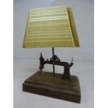 Unusual Howe sewing machine converted to a lamp base