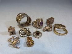 Small selection of silver charms and pendants along with two hallmarked silver dress rings.